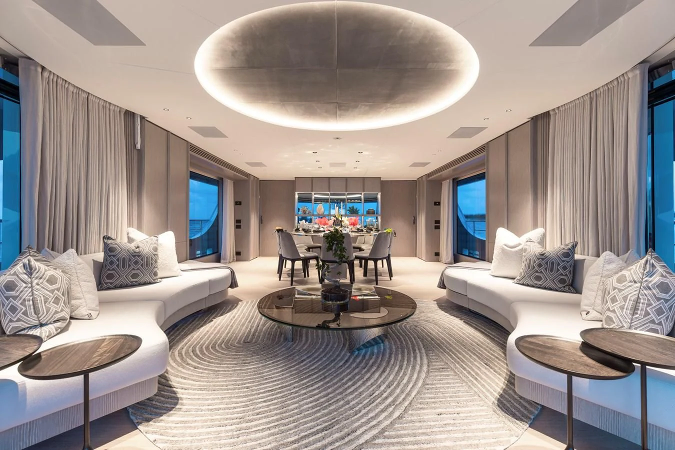 a room with a couch and a table and a television aboard SEAESTA Yacht for Sale