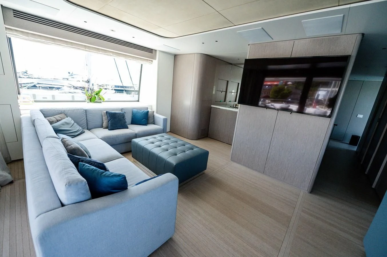 a living room with a couch and a table aboard SEAESTA Yacht for Sale