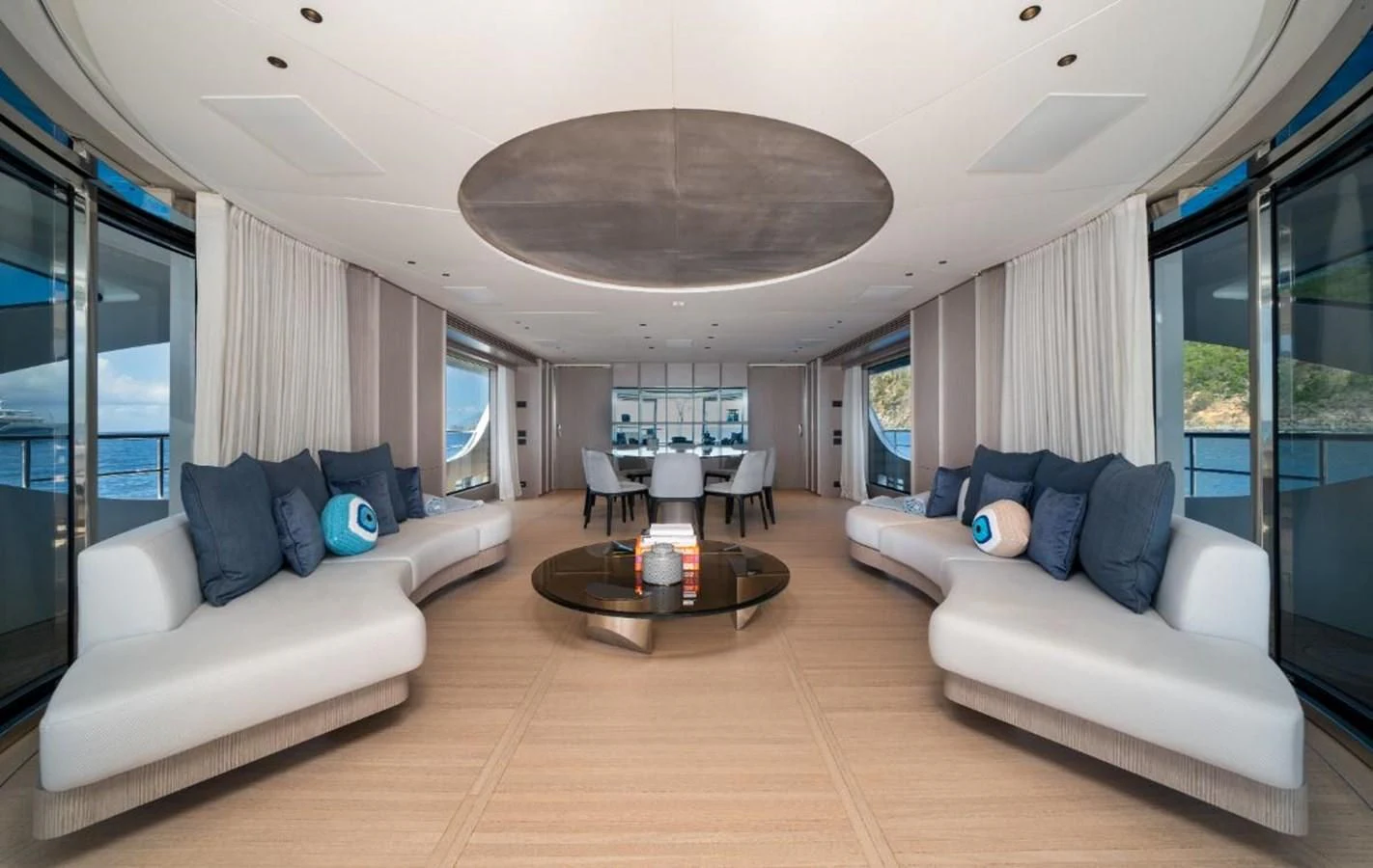 a living room with a large window aboard SEAESTA Yacht for Sale