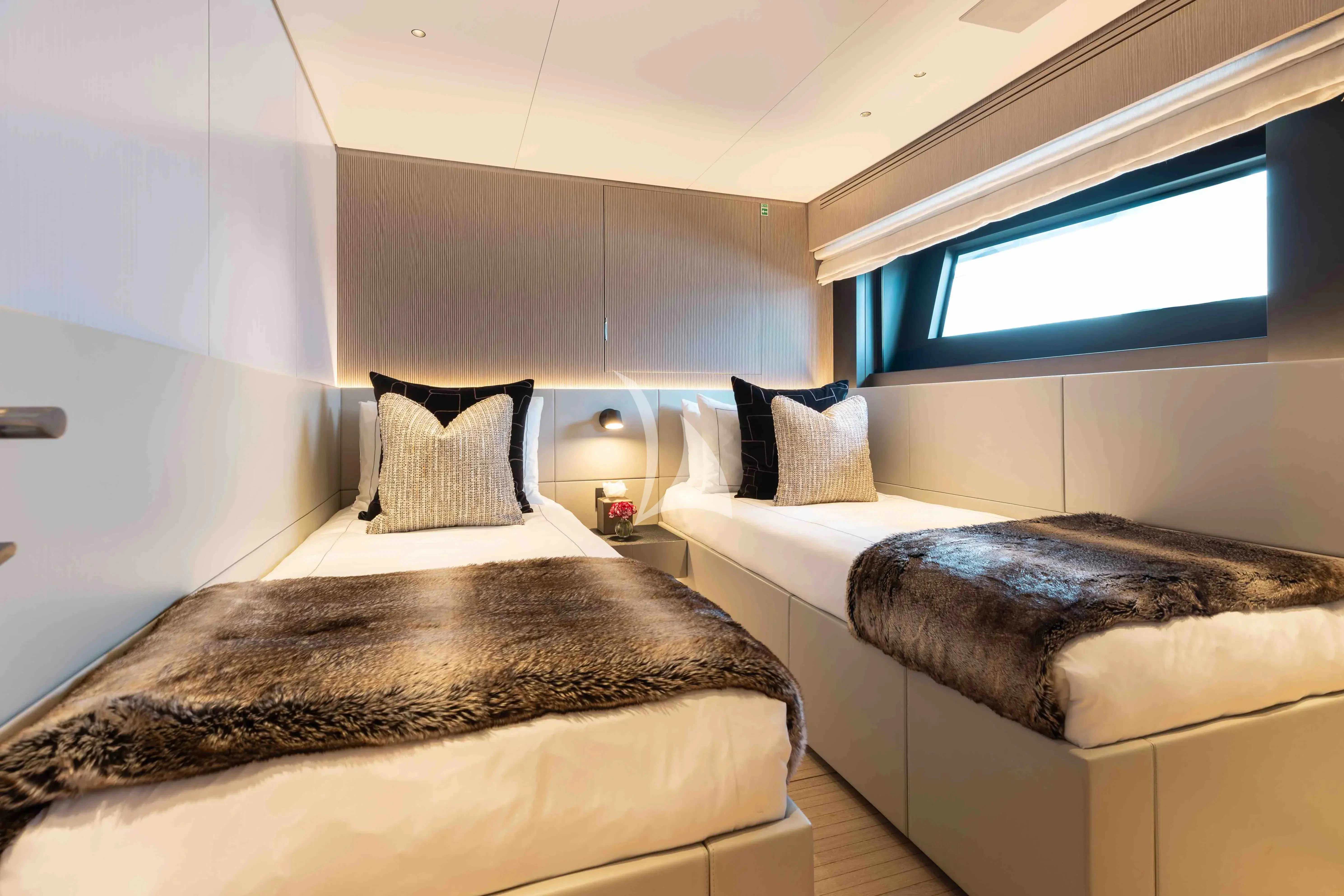a couple of beds in a room aboard SEAESTA Yacht for Sale