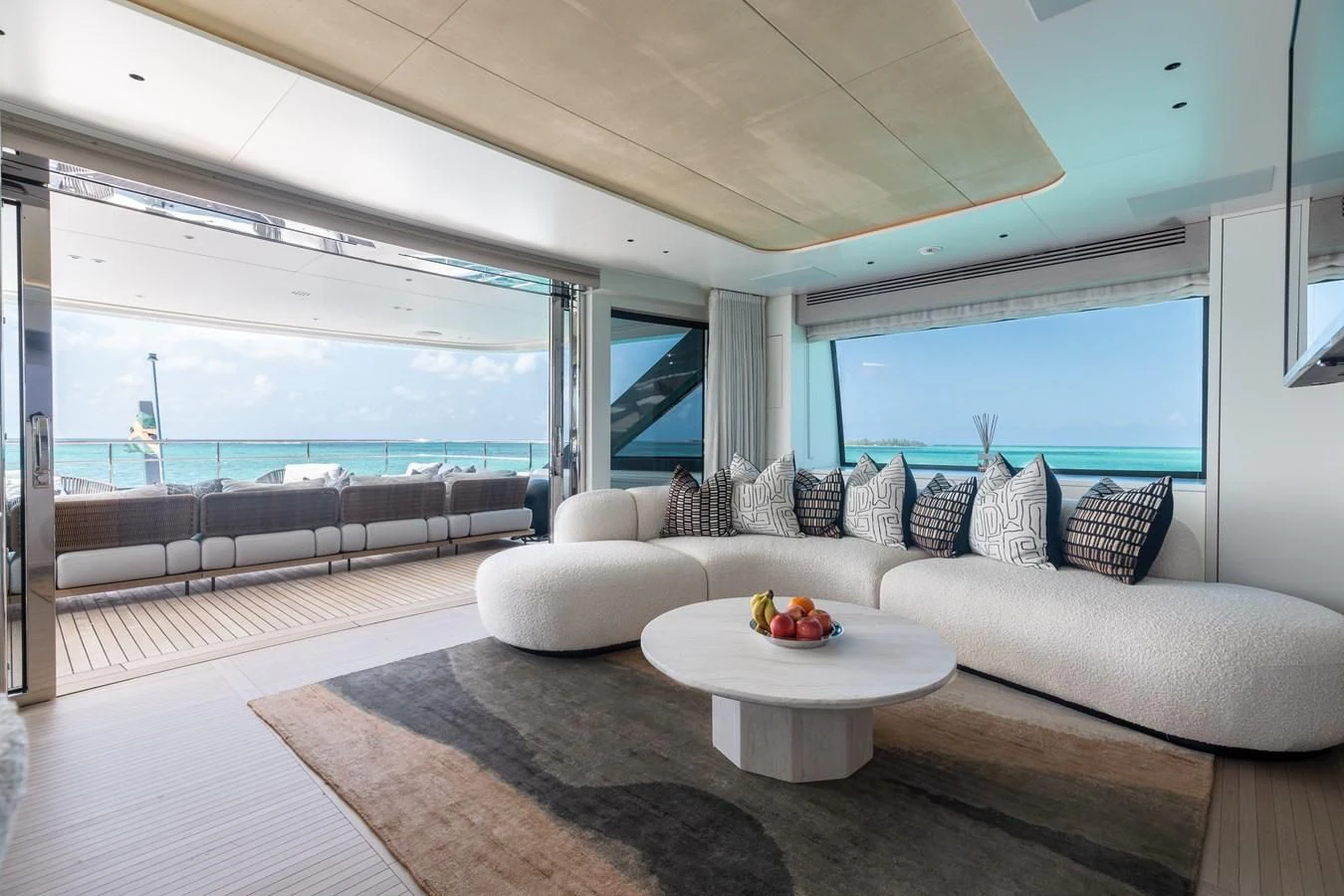 a living room with a large window aboard SEAESTA Yacht for Sale