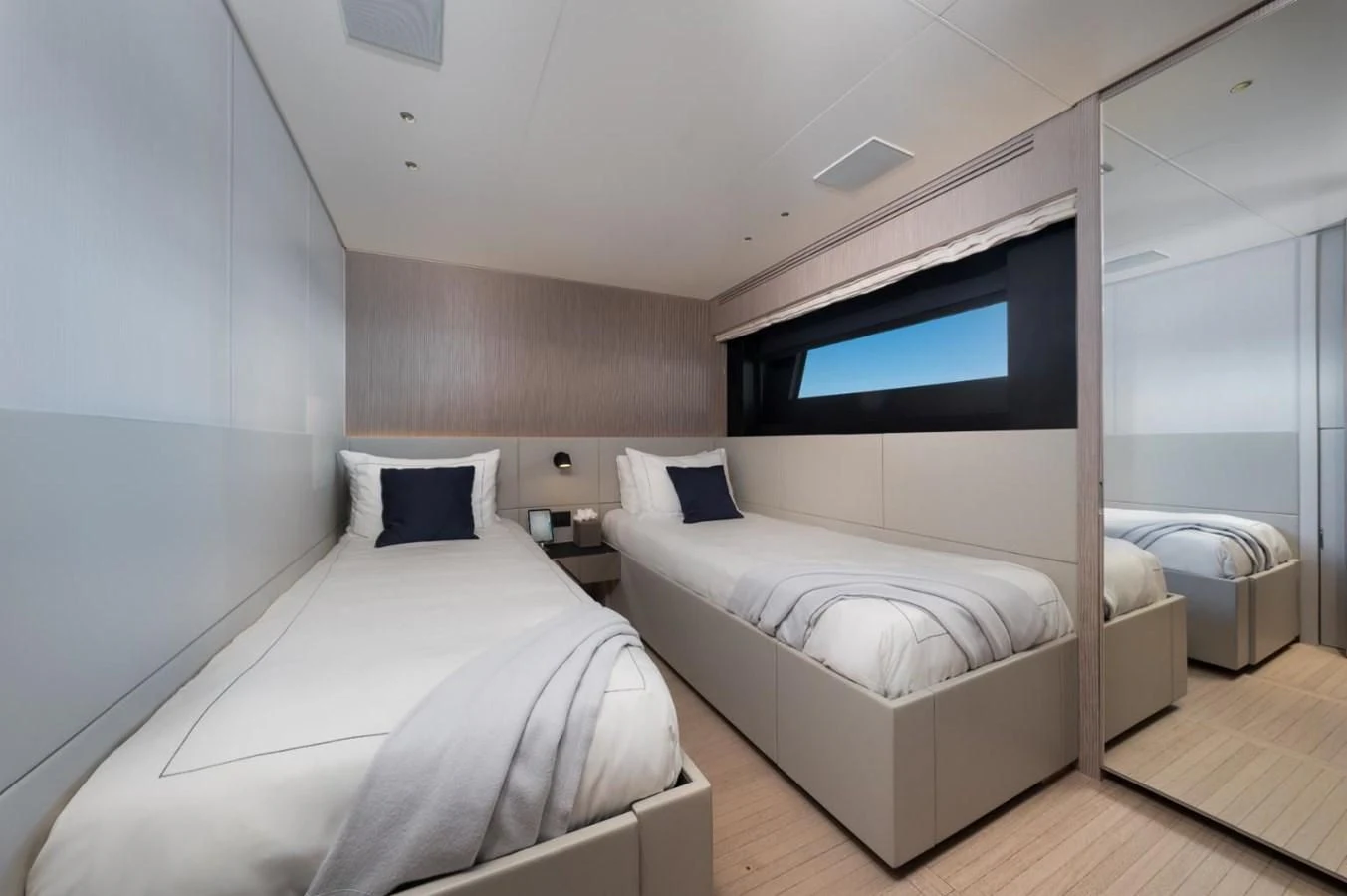 a room with two beds aboard SEAESTA Yacht for Sale