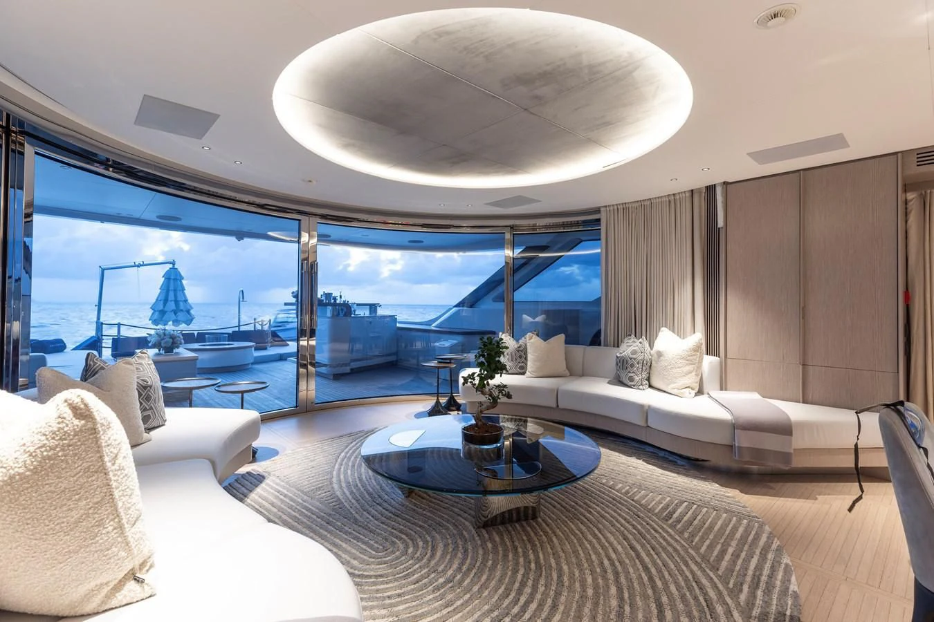 a room with a large window and a view of the ocean aboard SEAESTA Yacht for Sale