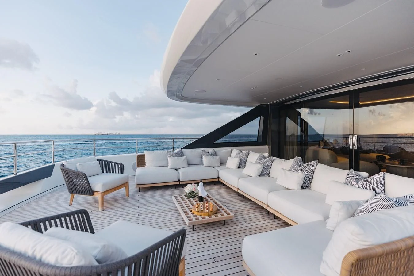 a living room with a large window aboard SEAESTA Yacht for Sale