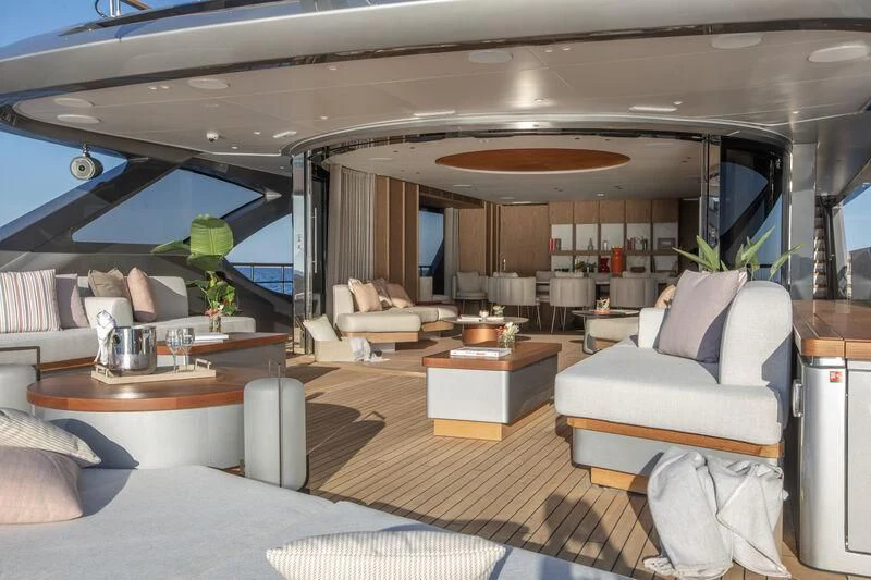 a room with a couch and a table aboard SEAESTA Yacht for Sale