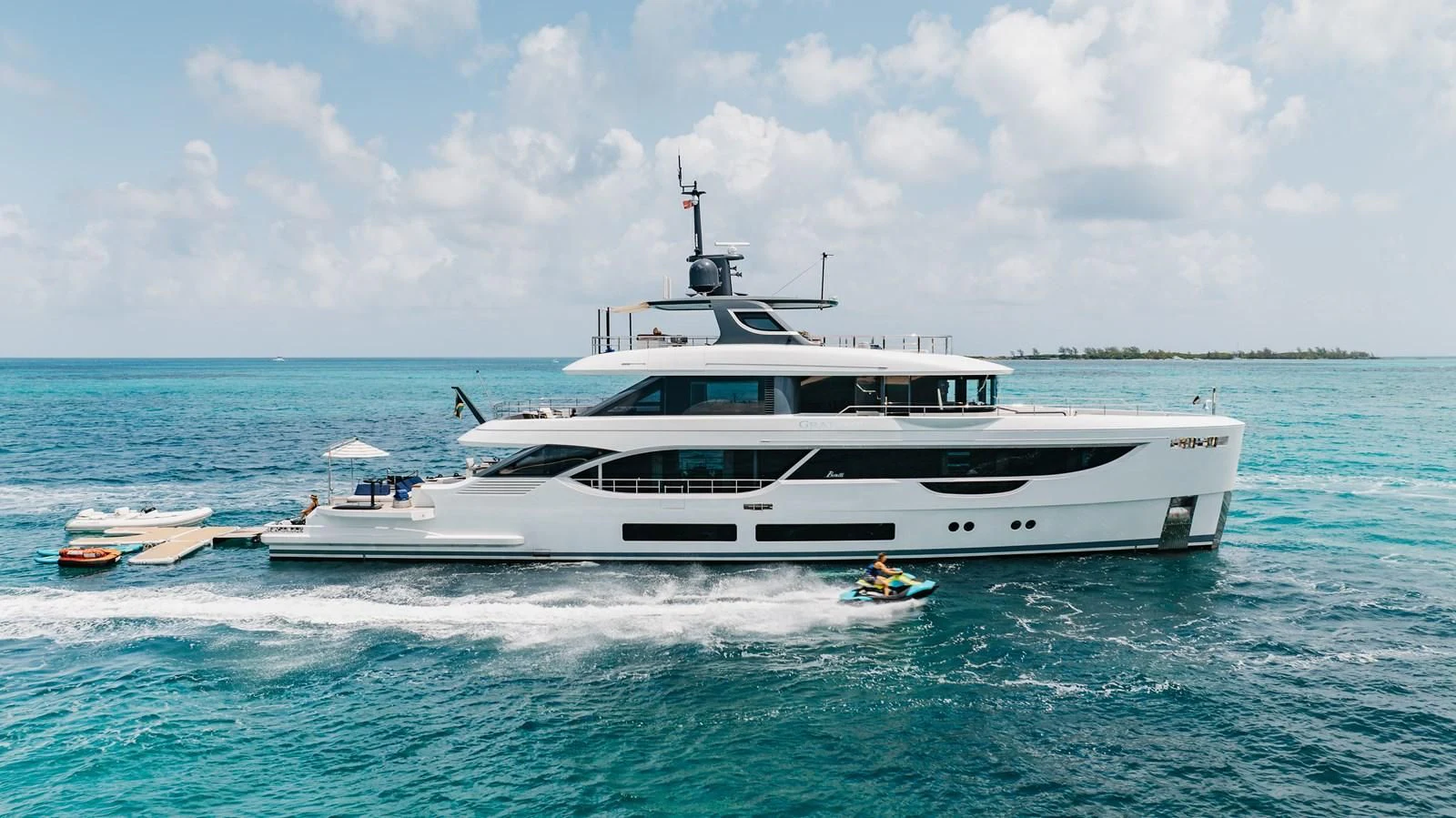 a white yacht in the water aboard SEAESTA Yacht for Sale