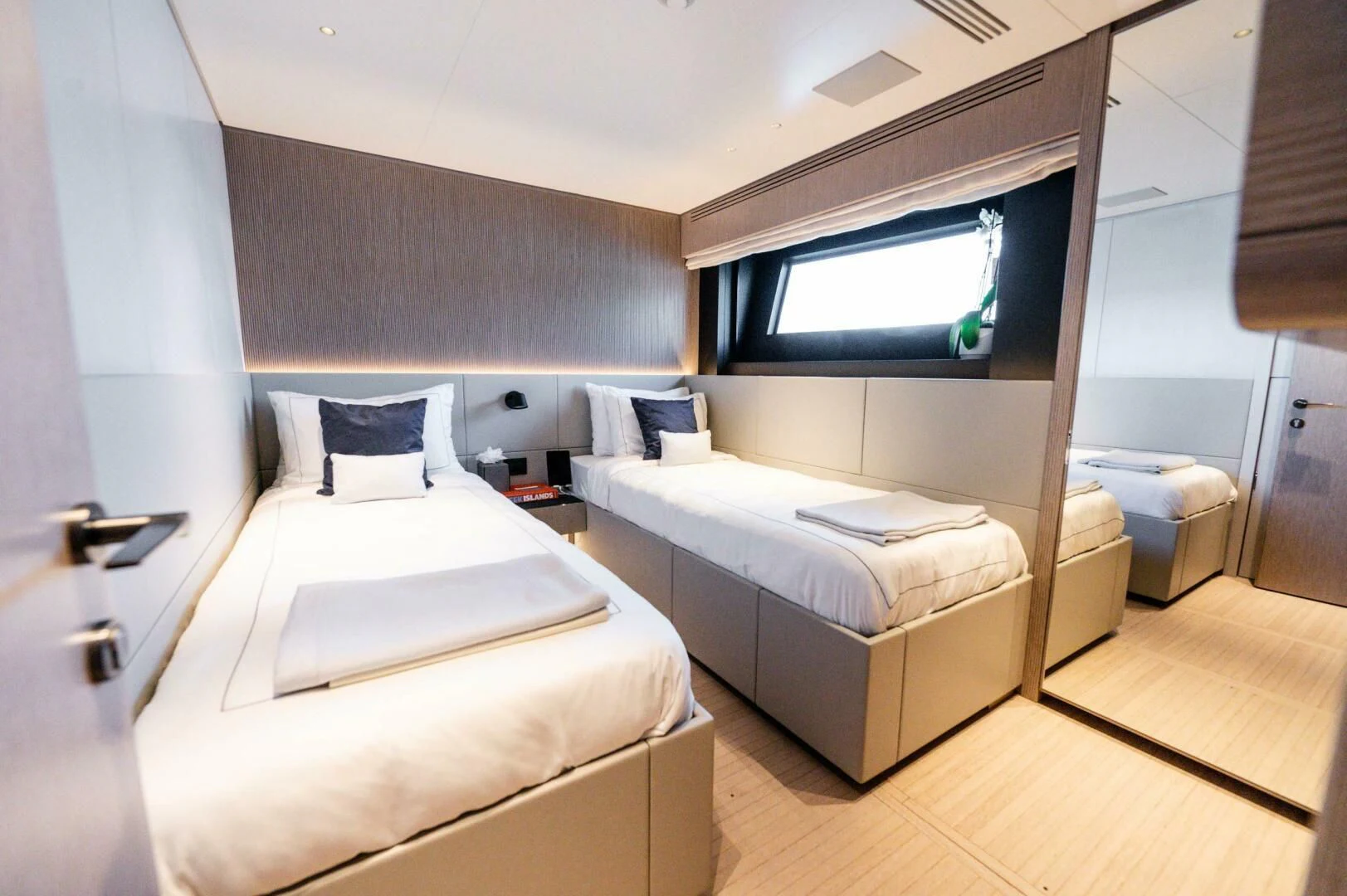 a room with two beds aboard SEAESTA Yacht for Sale
