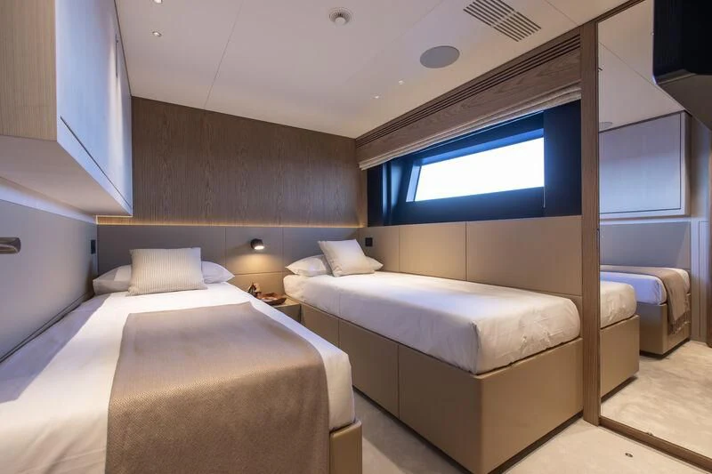a room with two beds aboard SEAESTA Yacht for Sale
