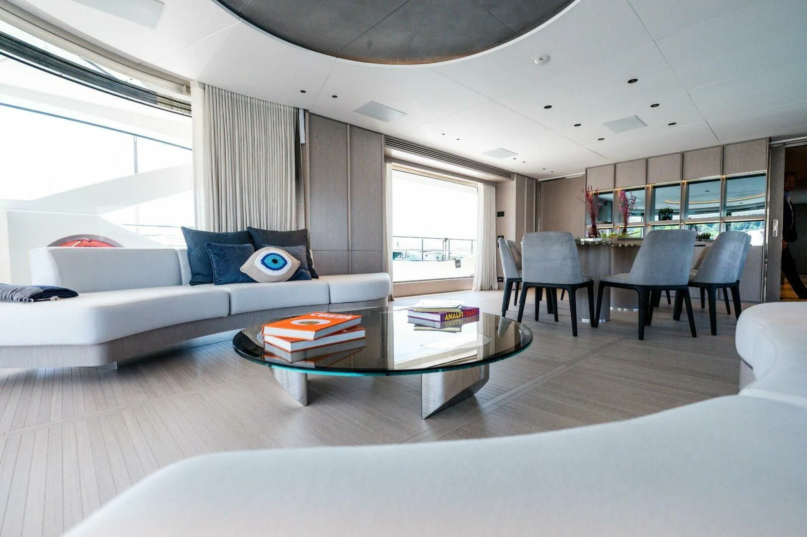 a living room with a couch and a coffee table aboard SEAESTA Yacht for Sale