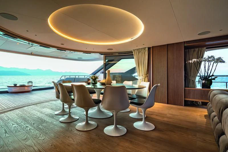 a room with a table and chairs aboard SEAESTA Yacht for Sale