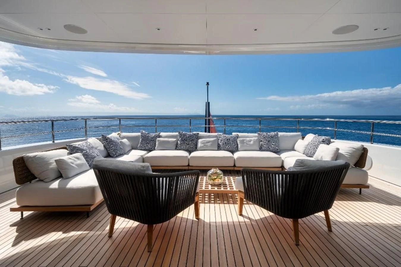 a large living room with a large ocean view aboard SEAESTA Yacht for Sale