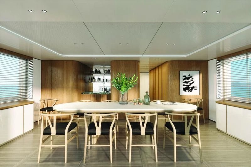 a large room with tables and chairs aboard SEAESTA Yacht for Sale