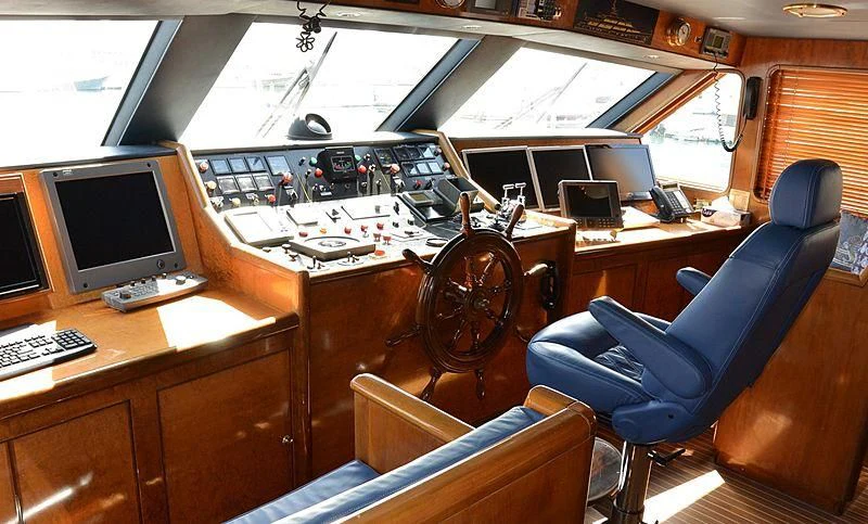 an airplane cockpit with a desk and computer aboard WHITE KNIGHT Yacht for Sale