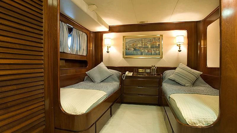 a room with two beds aboard ATHINA Yacht for Sale