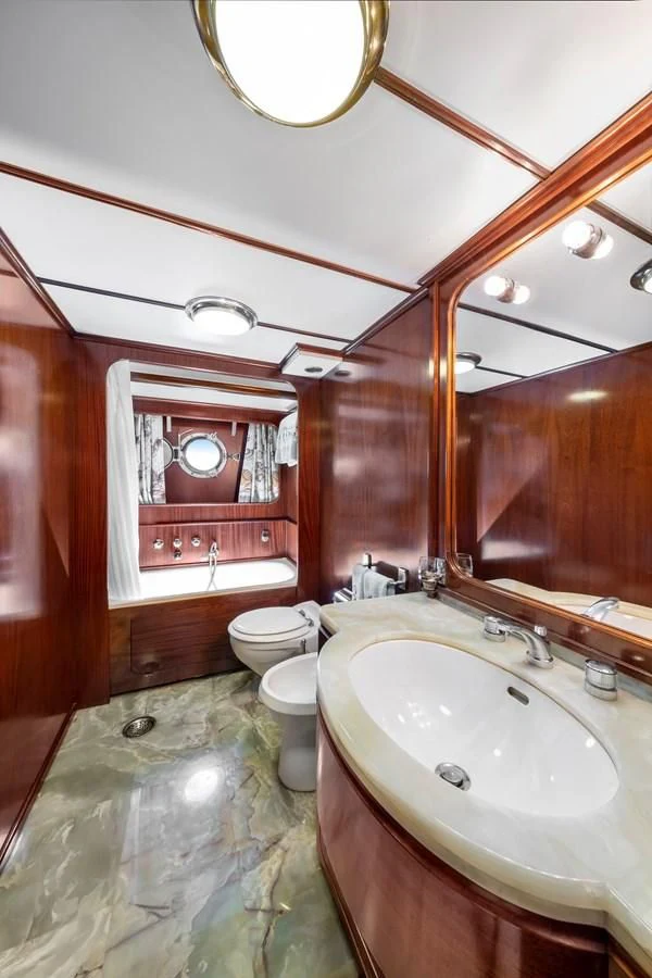 a bathroom with a sink and toilet aboard ATHINA Yacht for Sale