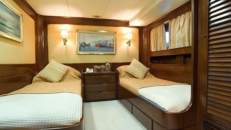a room with two beds aboard ATHINA Yacht for Sale