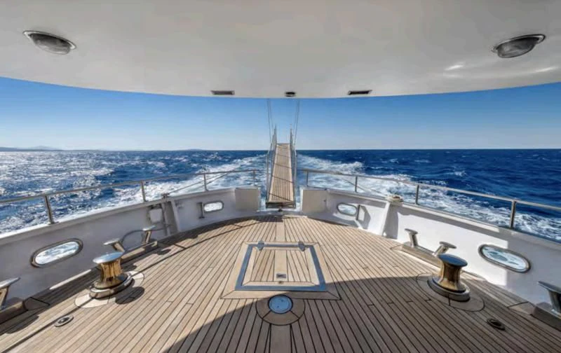 a deck with a view of the ocean and the ocean aboard ATHINA Yacht for Sale