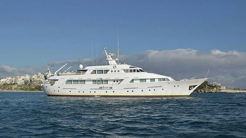 a large white boat in the water aboard ATHINA Yacht for Sale