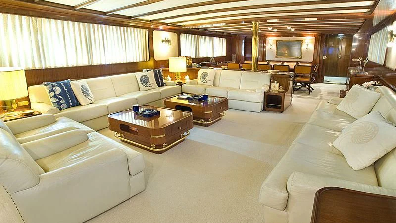 a large living room with a large window aboard ATHINA Yacht for Sale