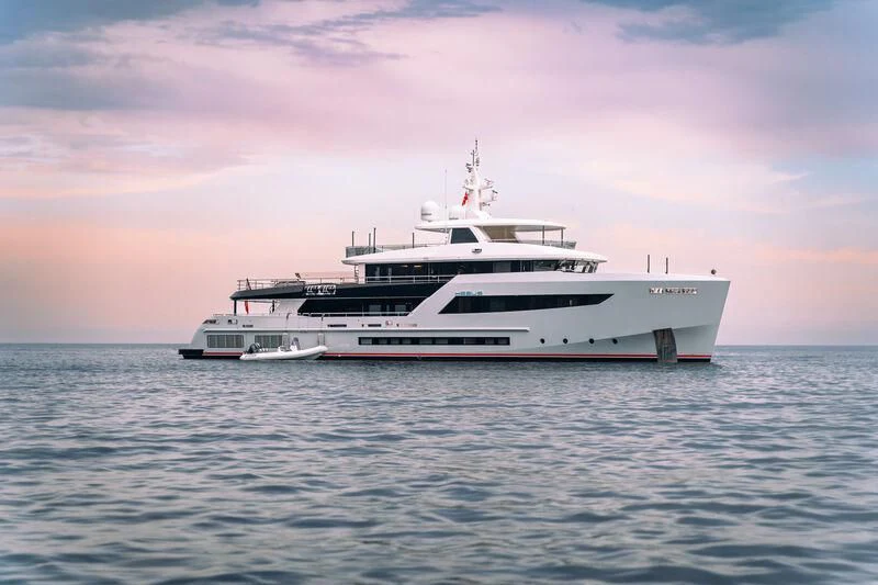 a white boat in the water aboard HEEUS Yacht for Sale