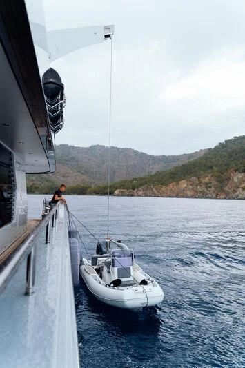 a person on a boat aboard HEEUS Yacht for Sale