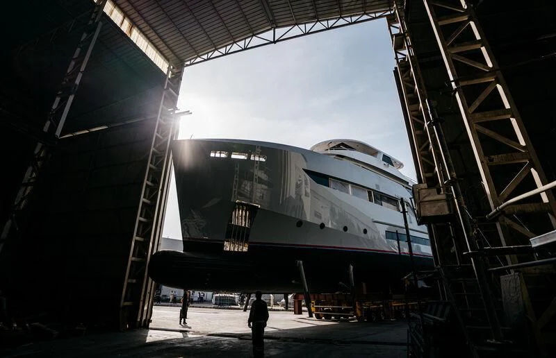 a train parked in a train station aboard HEEUS Yacht for Sale