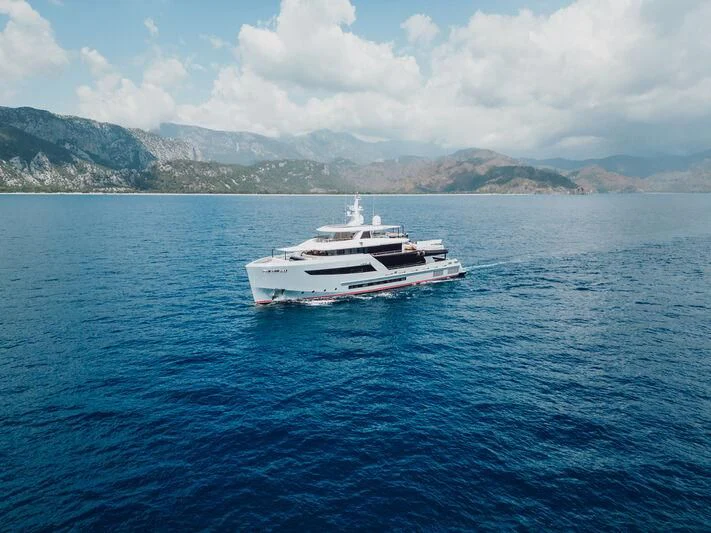 a boat on the water aboard HEEUS Yacht for Sale