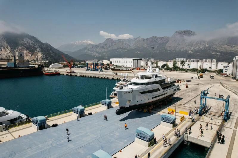 a group of boats are parked at a dock aboard HEEUS Yacht for Sale