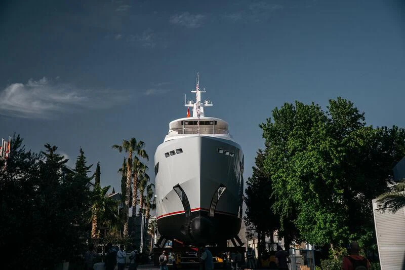 a white boat in the water aboard HEEUS Yacht for Sale