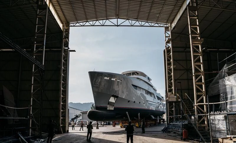 a large space shuttle on a platform aboard HEEUS Yacht for Sale