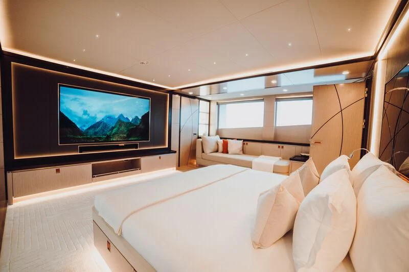 a room with a large television aboard HEEUS Yacht for Sale
