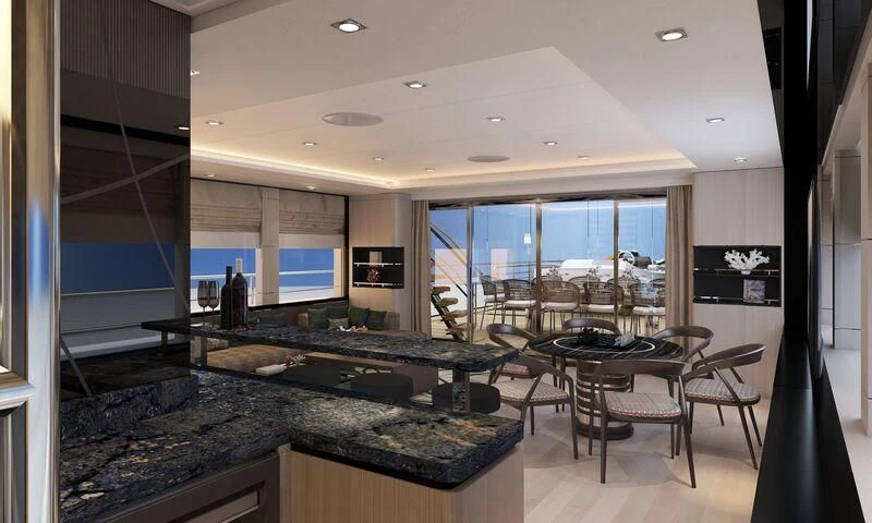 a large kitchen with a bar and bar area aboard HEEUS Yacht for Sale
