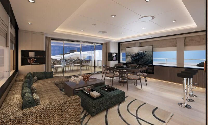 a living room with a large screen aboard HEEUS Yacht for Sale