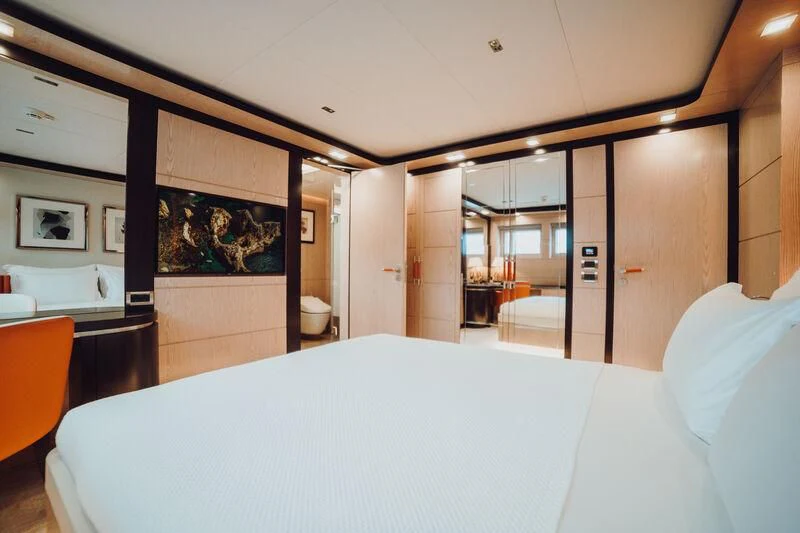 a room with a table and chairs aboard HEEUS Yacht for Sale