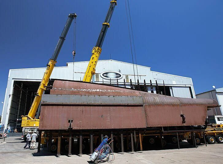 a large machine with a large metal frame aboard HEEUS Yacht for Sale