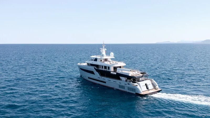 a white yacht in the water aboard HEEUS Yacht for Sale