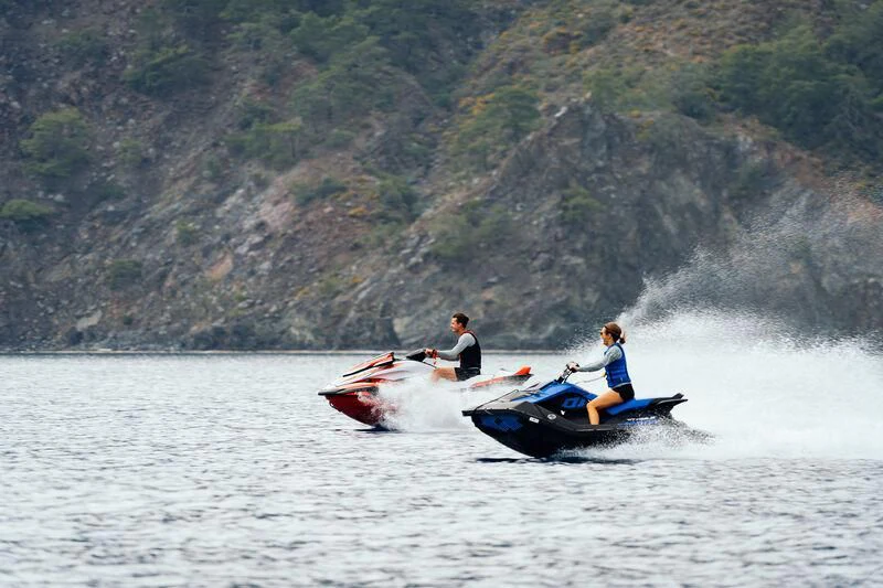 a group of people in canoes aboard HEEUS Yacht for Sale