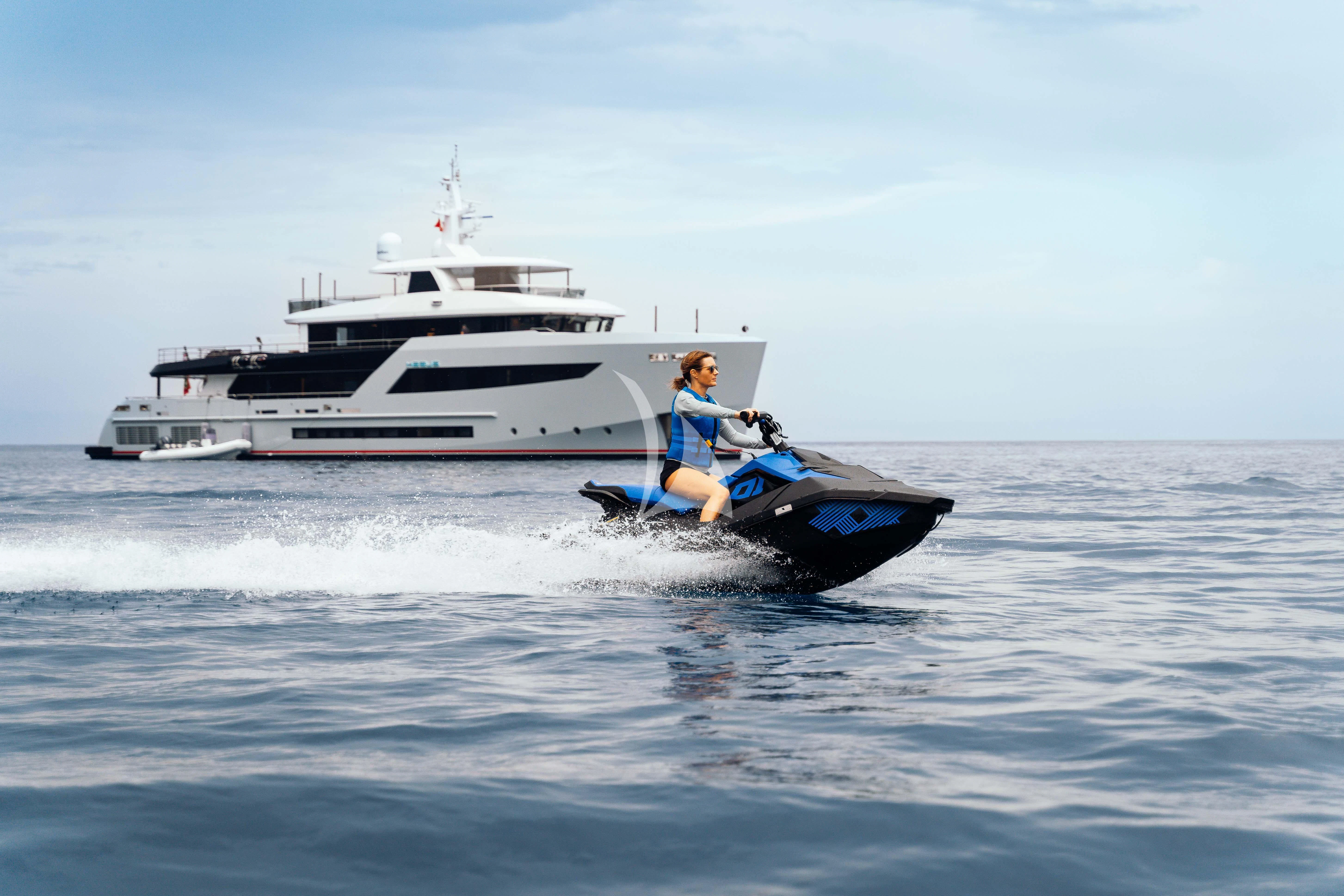 a person on a jet ski aboard HEEUS Yacht for Sale