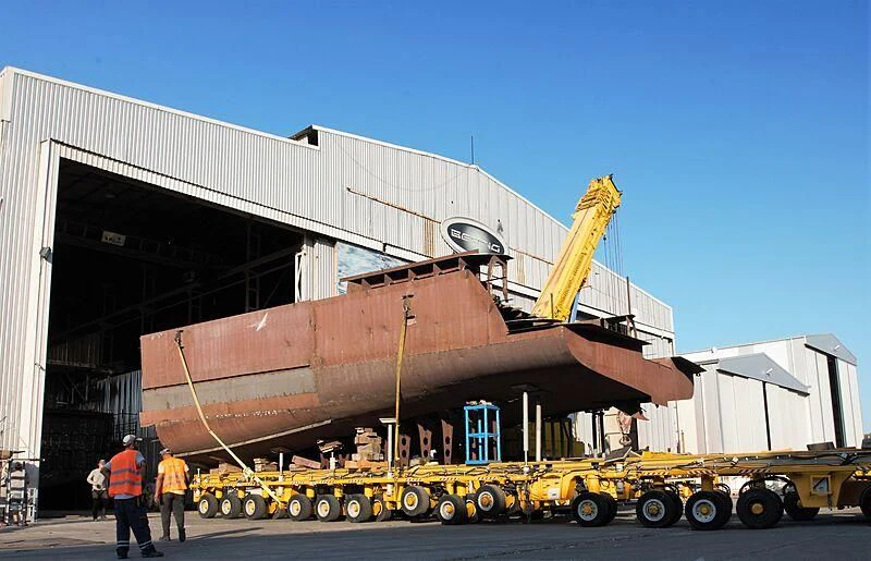 a large machine with a crane aboard HEEUS Yacht for Sale