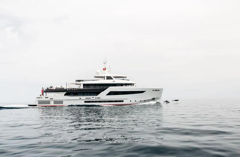 a white boat in the water aboard HEEUS Yacht for Sale