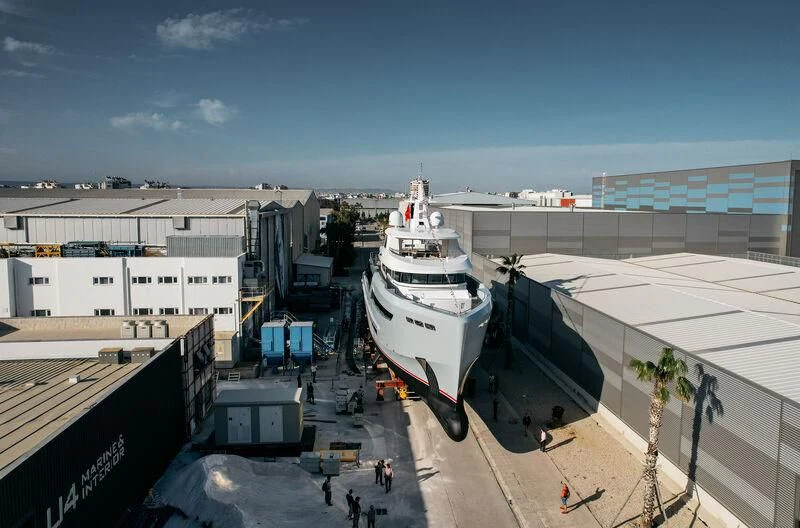 a boat docked at a port aboard HEEUS Yacht for Sale