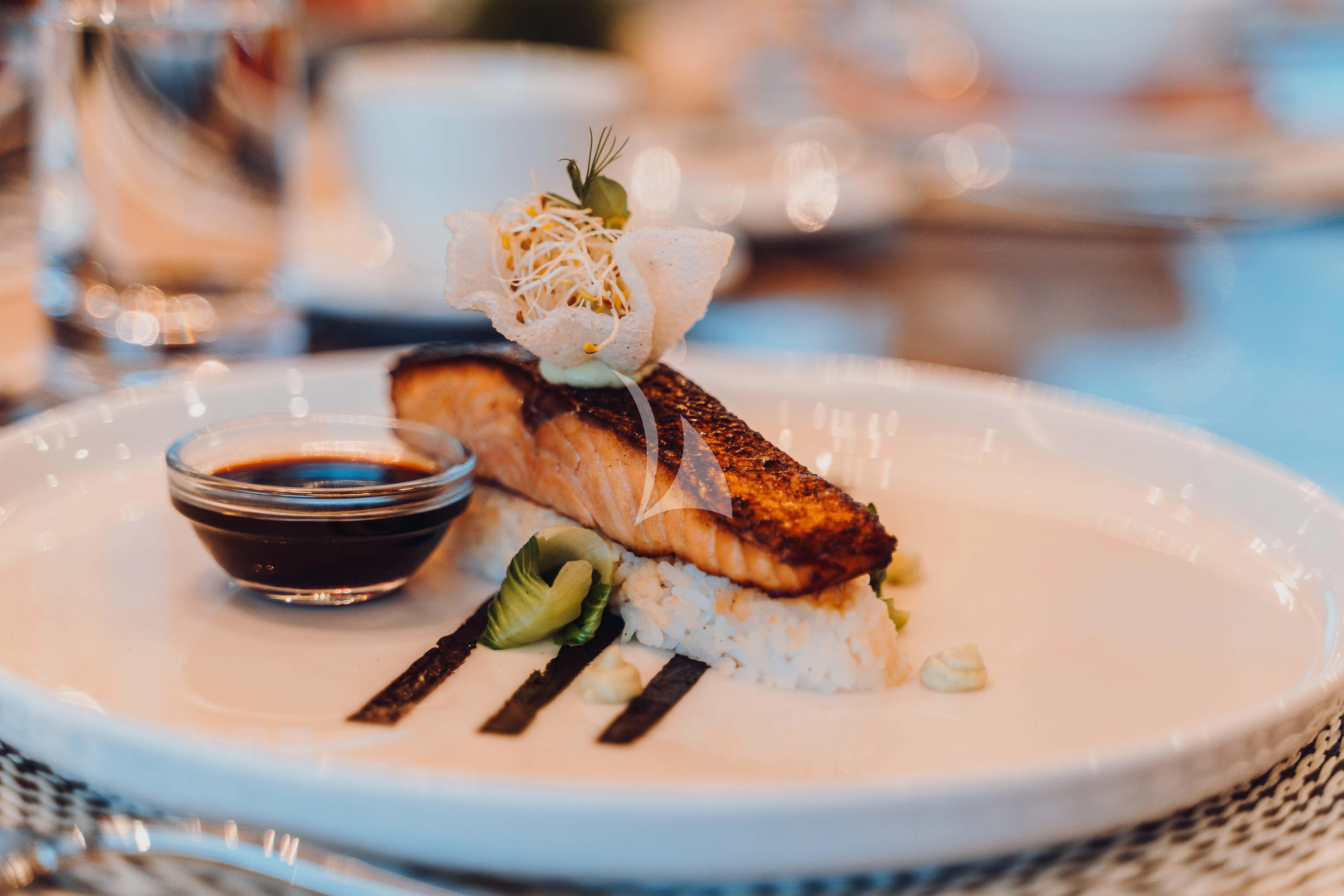 a plate of food aboard HEEUS Yacht for Sale