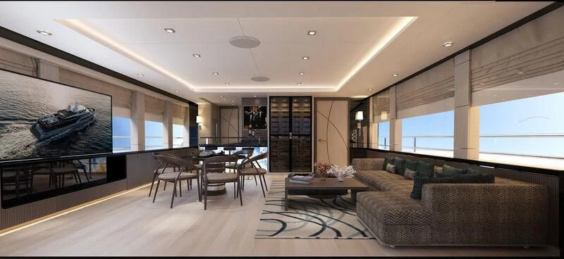 a living room with a couch and a table aboard HEEUS Yacht for Sale