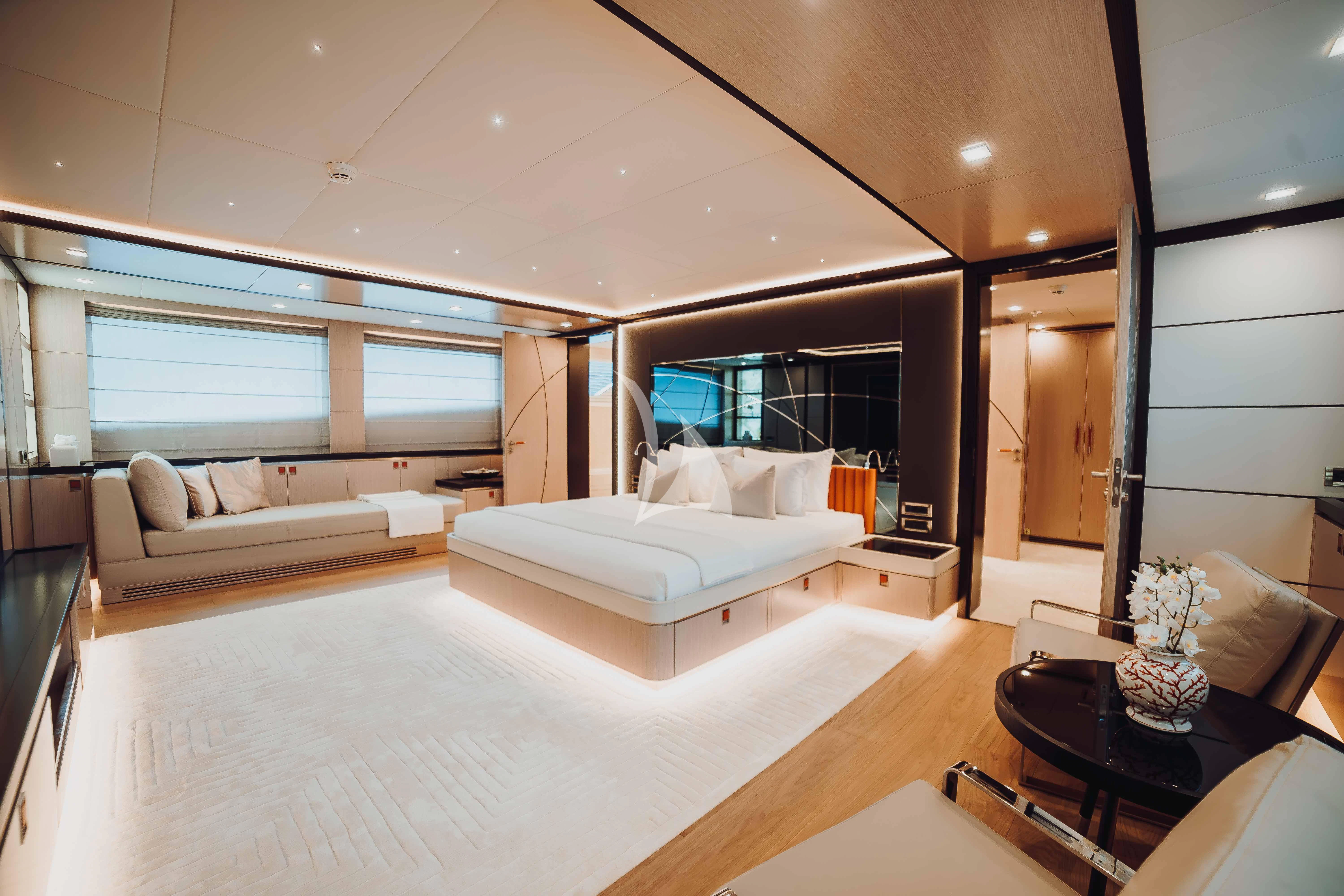 a large living room with a large window aboard HEEUS Yacht for Sale