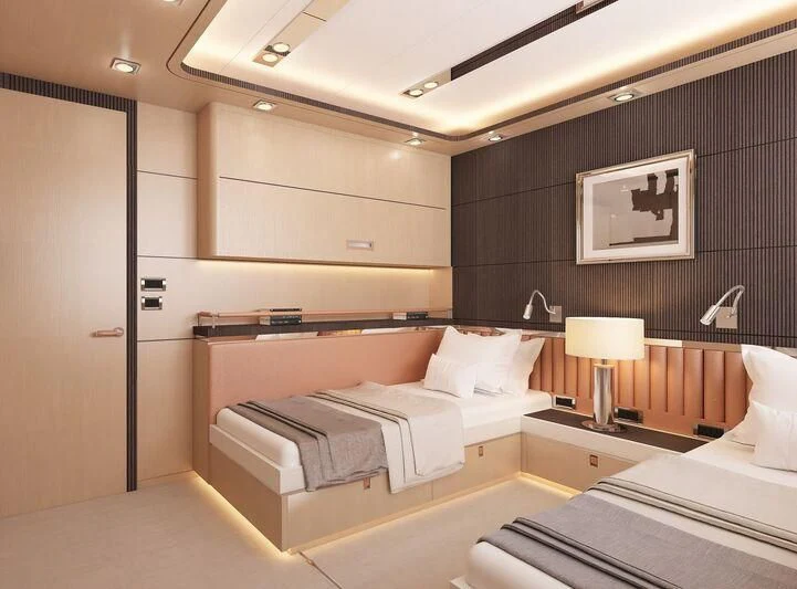 a room with a bed and a mirror aboard HEEUS Yacht for Sale
