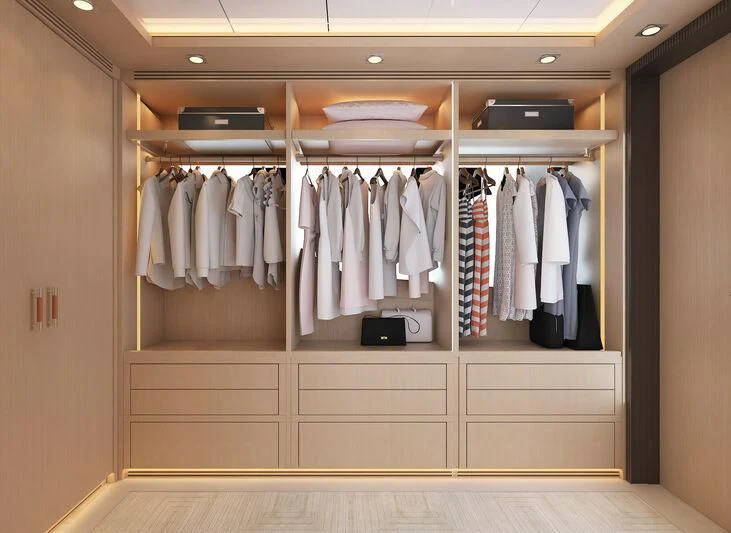 a closet with clothes aboard HEEUS Yacht for Sale