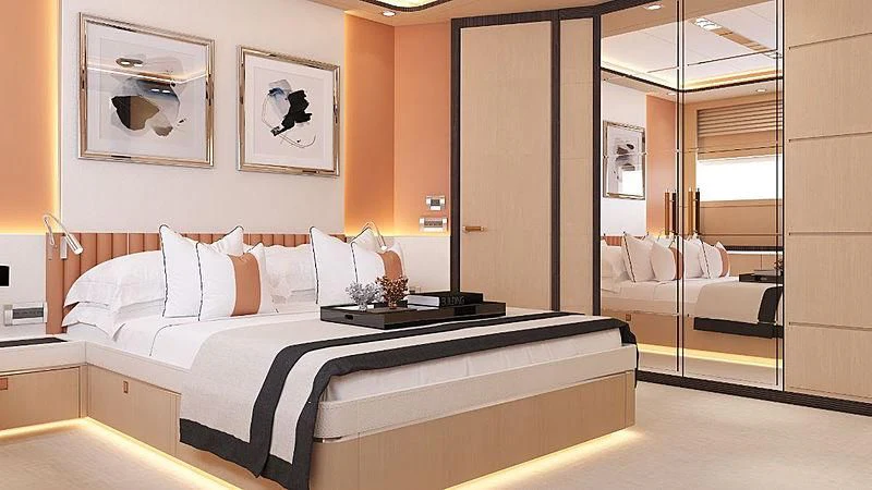 a bed with white sheets aboard HEEUS Yacht for Sale