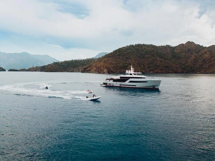 a boat on the water aboard HEEUS Yacht for Sale