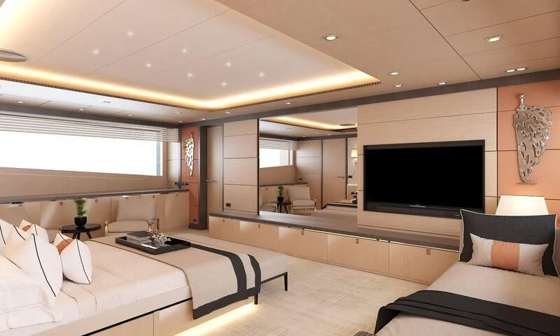 a room with a bed and a tv aboard HEEUS Yacht for Sale