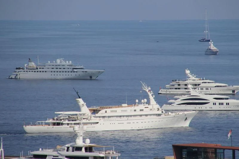 a group of boats in the water aboard ATLANTIS II Yacht for Sale